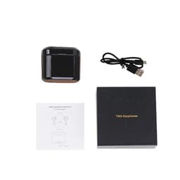 A black charging case with true wireless earbuds, a USB charging cable, and a user manual on a flat surface.
