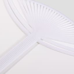 A white PVC hand fan with a smooth surface and thin slats, featuring a simple design and a central handle.