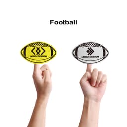 Two foam mitts in yellow and white, shaped like footballs, held up by hands. Each mitt features a logo design.