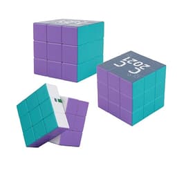 A set of three 3x3 puzzle cubes in teal and purple, featuring a logo on one side.