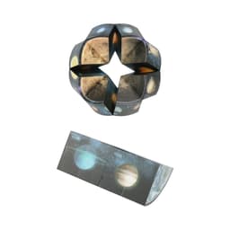 A 3D puzzle disc featuring images of planets, with a star shape and vibrant colour design. It includes a foldable component.