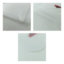 A large transparent storage bag with smooth edges, showcasing multiple angles of its clear design.