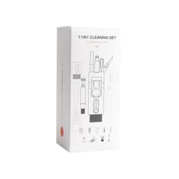 A cleaning kit box featuring various cleaning tools, predominantly in white with black and red accents. It has a logo.