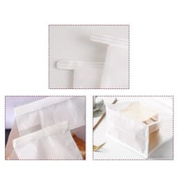 A white storage bag with a zip closure and a transparent section, featuring a logo. It appears in multiple angles.