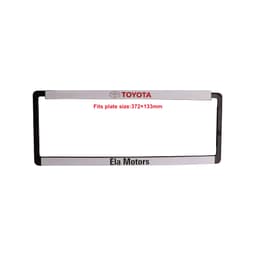 A plastic licence plate frame in black and silver, featuring a logo and space for plate size.