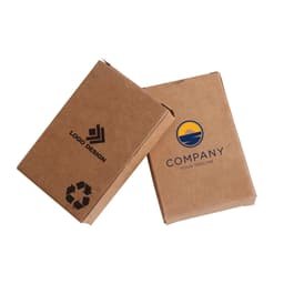 Two sets of Kraft paper playing cards in brown packaging, featuring logos on the boxes.