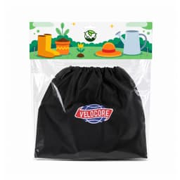A black drawstring bag with a logo, packaged for waterproof boot covers. The background features gardening elements.