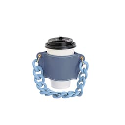 A drink bottle holder in blue leather with an acrylic strap, featuring a coffee cup nestled inside.