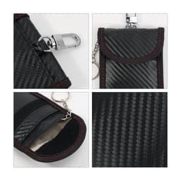A black carbon fibre Faraday key pouch with red stitching, featuring a clasp and a keyring attachment.
