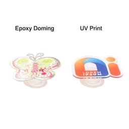 A butterfly-shaped acrylic phone pop holder and a custom-shaped holder with a multicoloured design, both with a clear base.