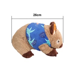 A brown wombat plush toy with a blue patterned scarf, measuring 26cm in length. Features a logo on the scarf.