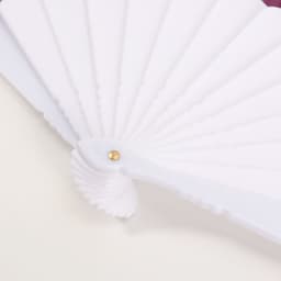 A white paper hand-held fan with a spiral handle, featuring multiple slats fanned out.