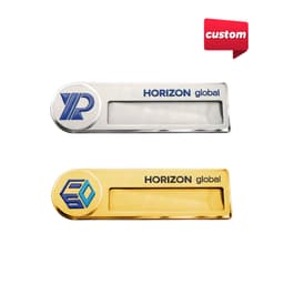 A silver and a gold custom reusable metal name badge with logos and clear name sections.