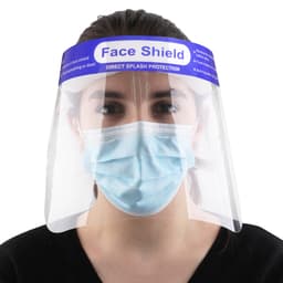 A protective face shield made of clear plastic, worn over a blue surgical mask, features a logo on the top.