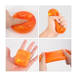 A colourful squishy stress relief cube in vibrant orange, featuring various shapes and textures.