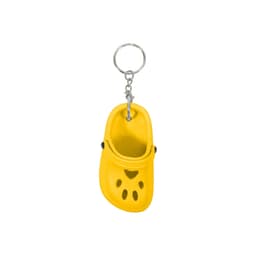 A yellow paw-shaped clog shoe keyring with a metal ring attachment. It features ventilation holes and a rounded toe.