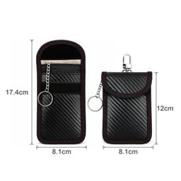 A black carbon fibre Faraday key pouch with red stitching, featuring a keyring and a clip.