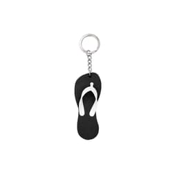 A black and white thongs-shaped EVA floating keychain with a metal keyring.