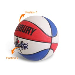 A promotional basketball featuring red, white, and blue panels, with a logo displayed on its surface.