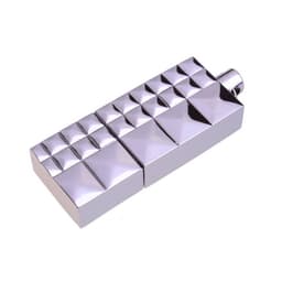 A silver flash drive with a geometric design featuring square and rectangular sections.