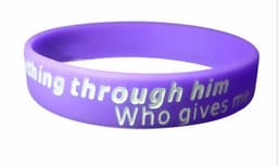 A purple silicone wristband featuring white text and a logo.