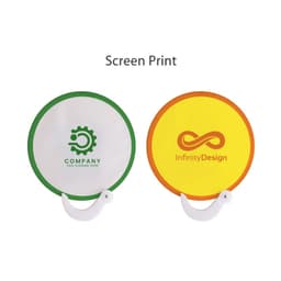 A foldable fan with a white and green design on one side and a yellow and orange design on the other. Features a handle and logo.