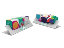 A colourful suspension block calendar with geometric patterns, displayed on a sleek silver stand, featuring a logo.