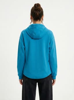 A women's/junior hoodie in vibrant blue, featuring a hood and long sleeves, with a logo present.