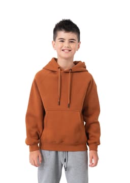 A brown hoodie with a kangaroo pocket and drawstring hood, modeled by a smiling young boy wearing grey pants.