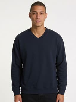 A men's/unisex navy V-neck fleece jumper with long sleeves and a logo, featuring a classic fit.