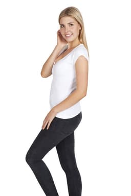 A white women's Hanley T-shirt, featuring a fitted design, displayed on a model wearing black leggings.