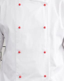 A white chef's jacket featuring red exchangeable buttons along the front. It has a simple, clean design.