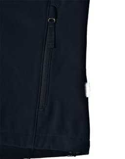 A black ladies softshell jacket featuring a zip pocket and a logo on the side.