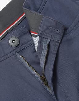 Navy blue Men's Jean Style Flexi Chino Pants featuring a button and zip fly. Includes a branded logo.