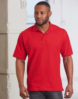 A red unisex traditional polo shirt displayed on a model, featuring a branding logo.