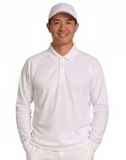 A long-sleeved white cricket polo shirt displayed on a smiling man wearing a matching white cap.