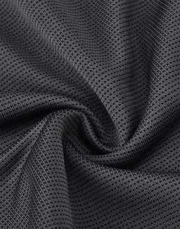 A close-up of textured black fabric, showcasing a lightweight and breathable mesh design suitable for sports apparel.