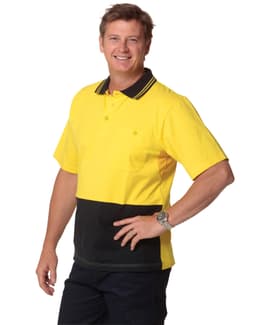 A man wearing a yellow and black two-tone safety polo shirt with a collar and pocket, featuring a branding logo.