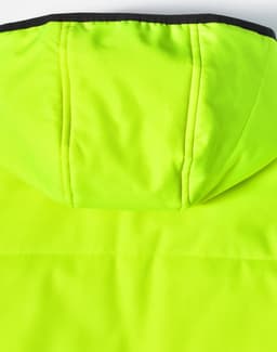 A bright yellow quilted safety jacket featuring a black collar and hood. It has a smooth finish.