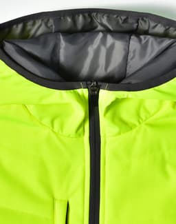 A Hi-Vis quilted safety jacket in bright yellow with a grey interior, featuring a front zip and a black trim.