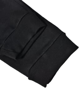 Black poly/cotton terry sweat pants with ribbed cuffs and a logo. Suitable for casual comfort.