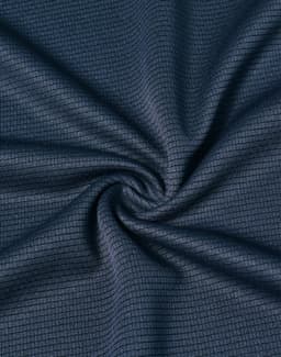 A close-up of a dark navy fabric with a subtle grid pattern, showcasing its lightweight texture.
