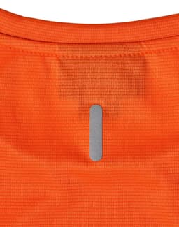 An orange ladies’ lightweight performance T-shirt featuring a logo on the back.