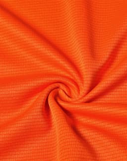 An orange textured fabric featuring a subtle check pattern, ideal for lightweight performance wear.