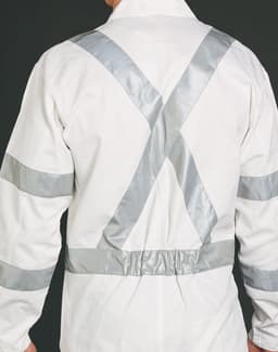A white coverall with silver reflective accents on the back, featuring cross-patterned straps.