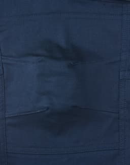 Navy unisex cotton stretch ripstop work pants with multiple pockets and a logo detail.