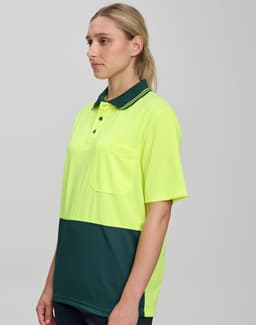 A high-visibility short-sleeve safety polo in bright yellow and dark green, featuring a pocket and a logo.