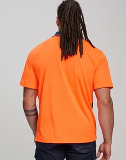 A back view of an orange short-sleeve polo shirt, featuring a logo and designed for workwear.