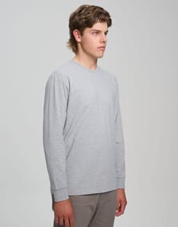 A grey long-sleeve cotton t-shirt for men, featuring a simple design and a logo on the chest area.