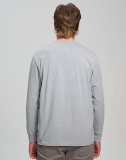 A grey long-sleeve tee shirt, featuring a simple design and a logo on the back.
